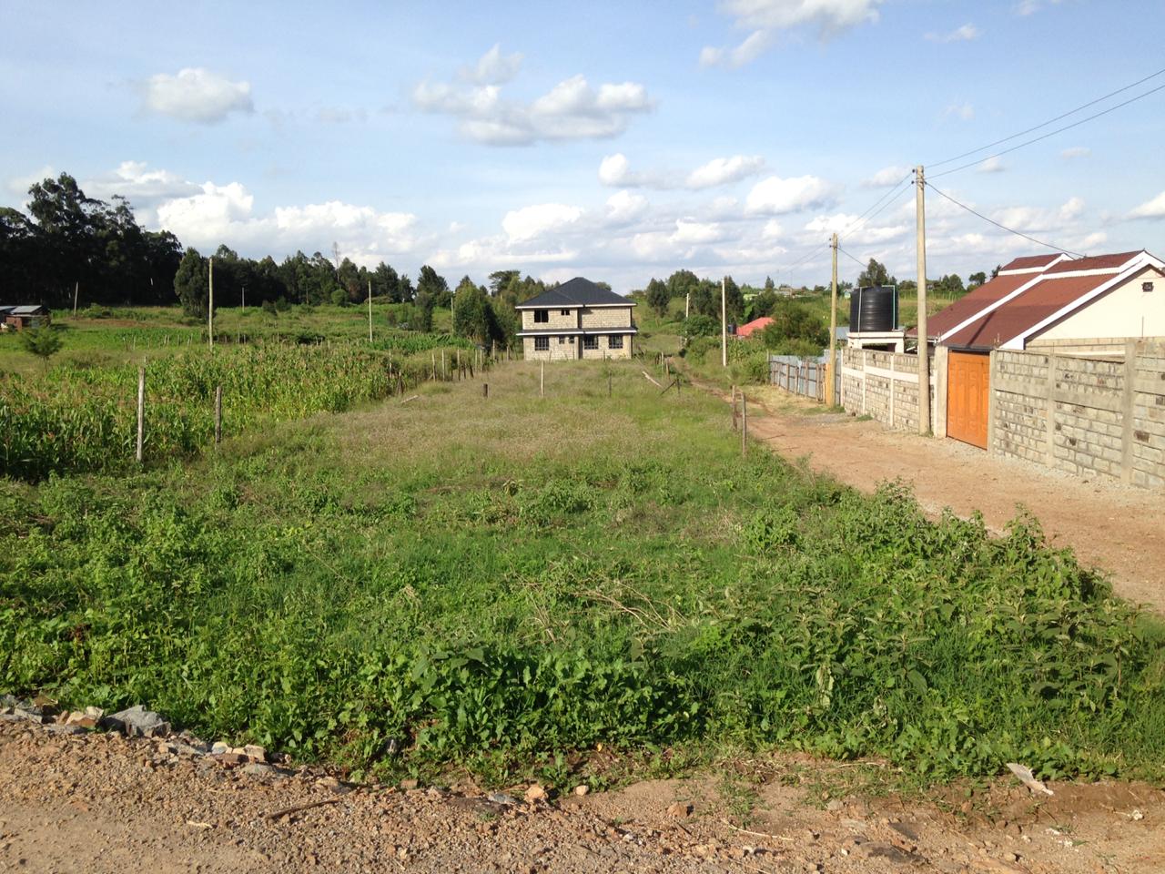 1/2 acre corner plot on distress sale in Kikuyu Kamangu.